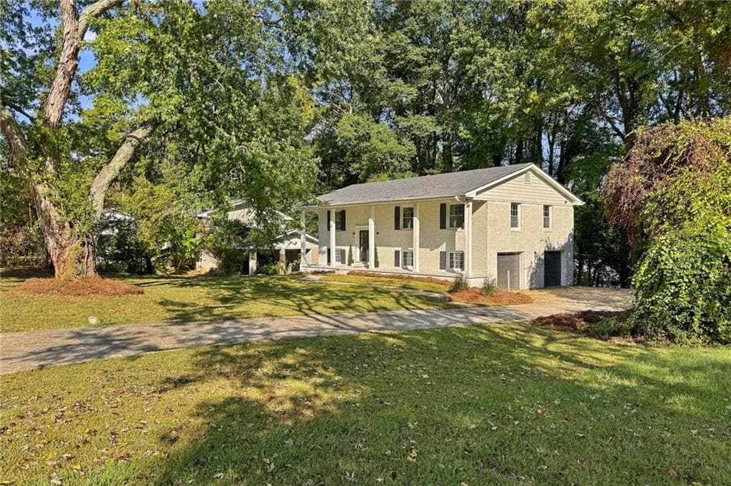 4 bedroom, 3 bathroom, 2,226 sq ft single family residence for sale at 2131 Chevy Chase Lane, Decatur, GA 30032 — photo 2