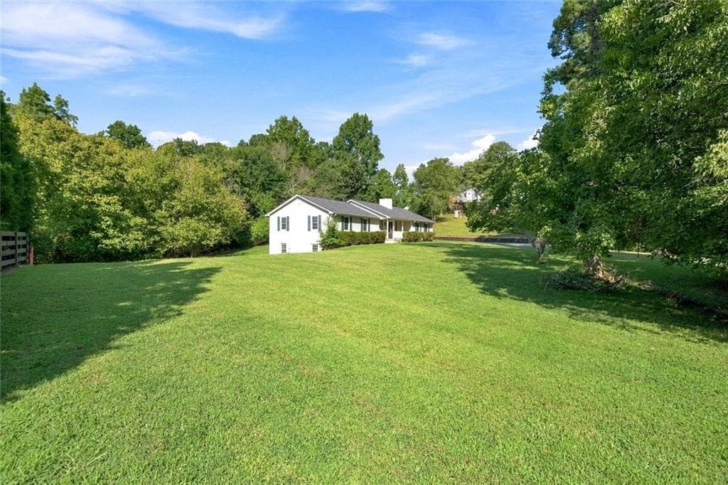 3 bedroom, 2 bathroom, 1,792 sq ft single family residence for sale at 13480 New Providence Road, Alpharetta, GA 30004 — photo 3