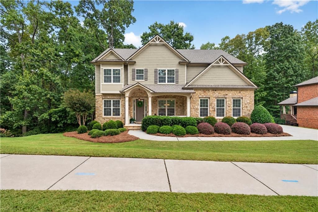 5 bedroom, 4 bathroom, 4,482 sq ft single family residence for sale at 2720 Cogburn Lane, Milton, GA 30004