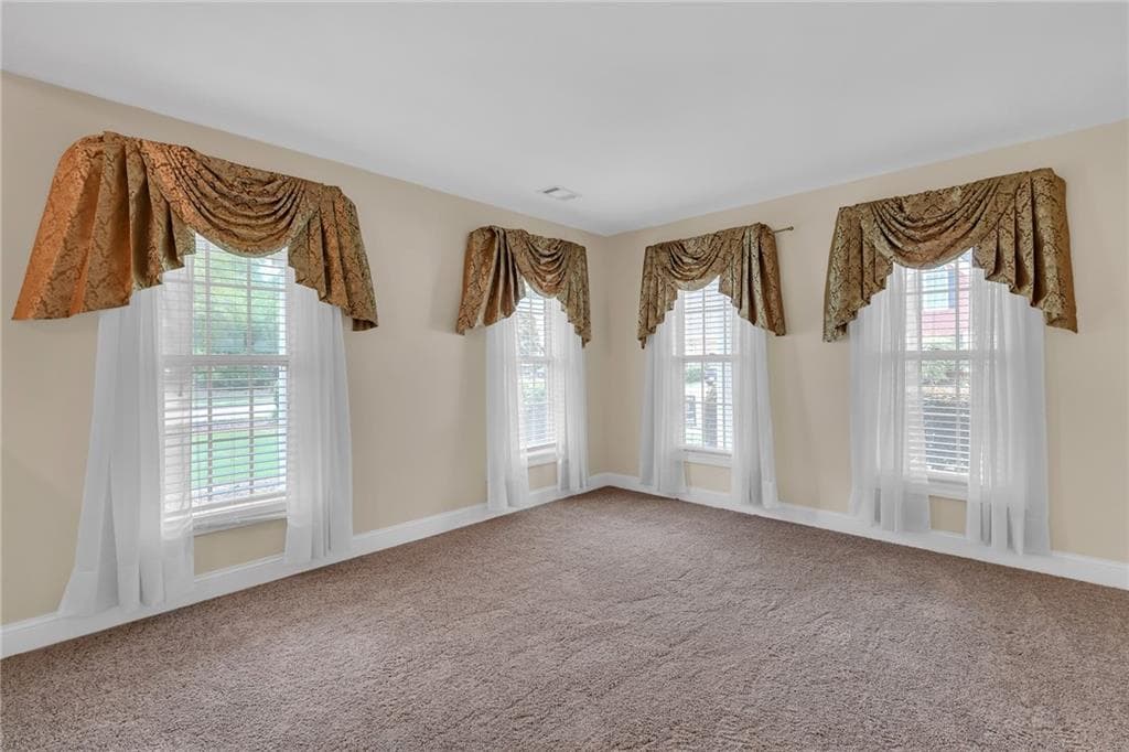 4 bedroom, 3 bathroom, 3,024 sq ft single family residence for sale at 2055 Hickory Station Circle, Snellville, GA 30078 — photo 3