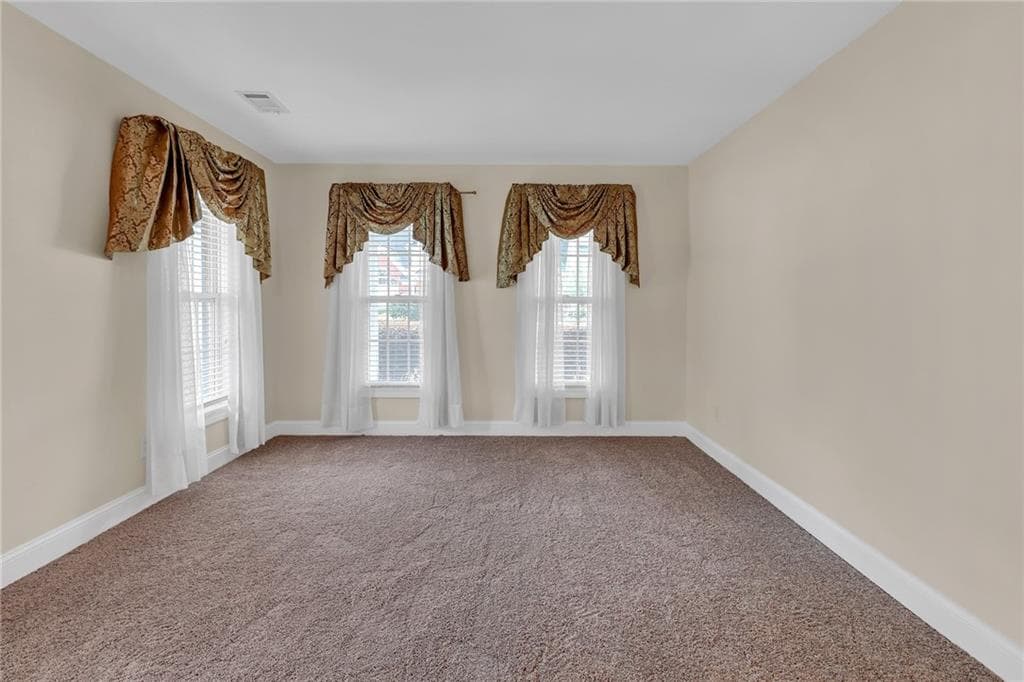 4 bedroom, 3 bathroom, 3,024 sq ft single family residence for sale at 2055 Hickory Station Circle, Snellville, GA 30078 — photo 5
