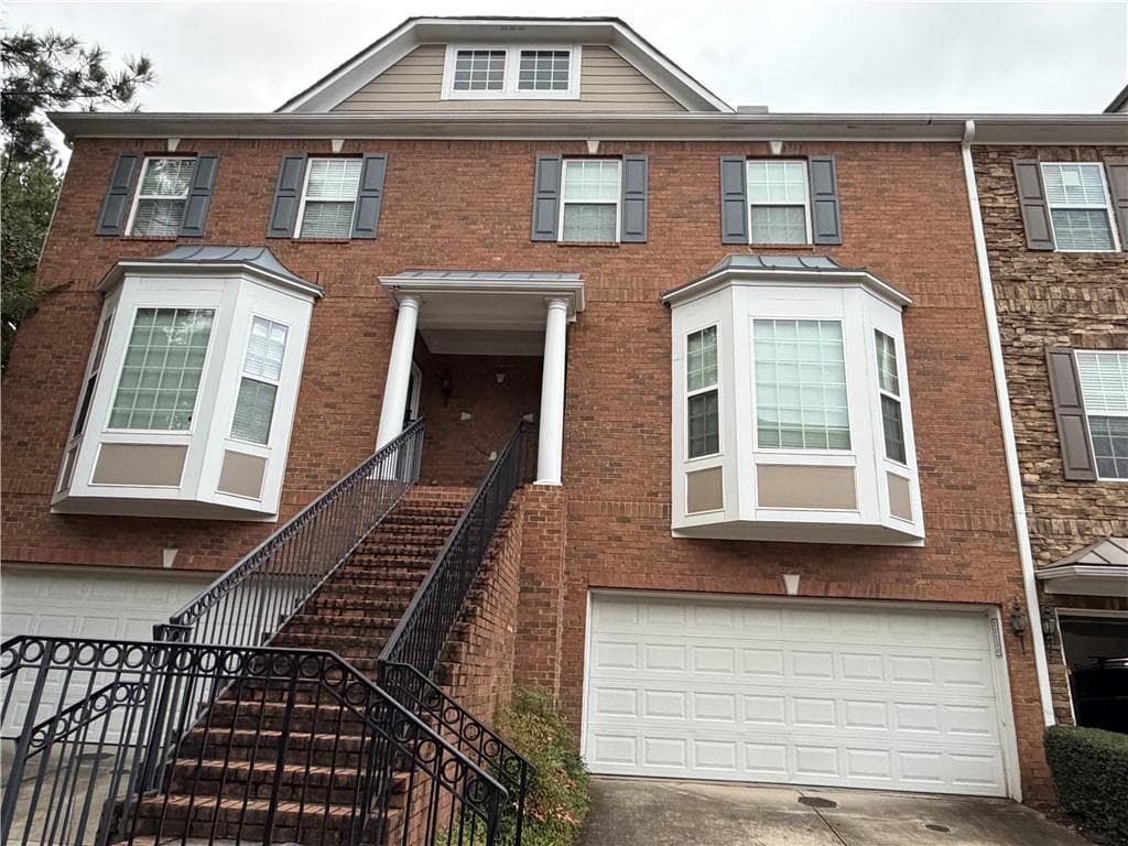 4 bedroom, 3 bathroom, 1,874 sq ft townhouse for rent at 11150 Skyway Drive, Johns Creek, GA 30097 for $2,700 a month — photo 1 of 24