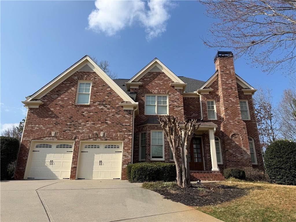 6 bedroom, 5 bathroom, 4,558 sq ft single family residence for sale at 3196 Nours Landing Circle, Duluth, GA 30097 — photo 4