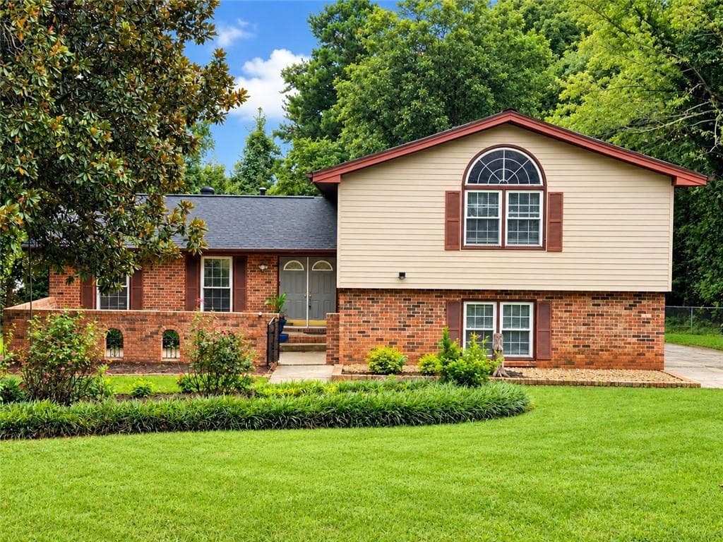 4 bedroom, 3 bathroom, 2,325 sq ft single family residence for sale at 4769 Dunover Circle, Doraville, GA 30360 — photo 1 of 34