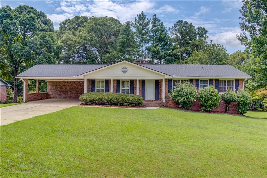4 bedroom, 3 bathroom, 3,292 sq ft single family residence for rent at 4461 S Roberts Drive, Sugar Hill, GA 30518 for $3,000 a month — photo 1 of 47