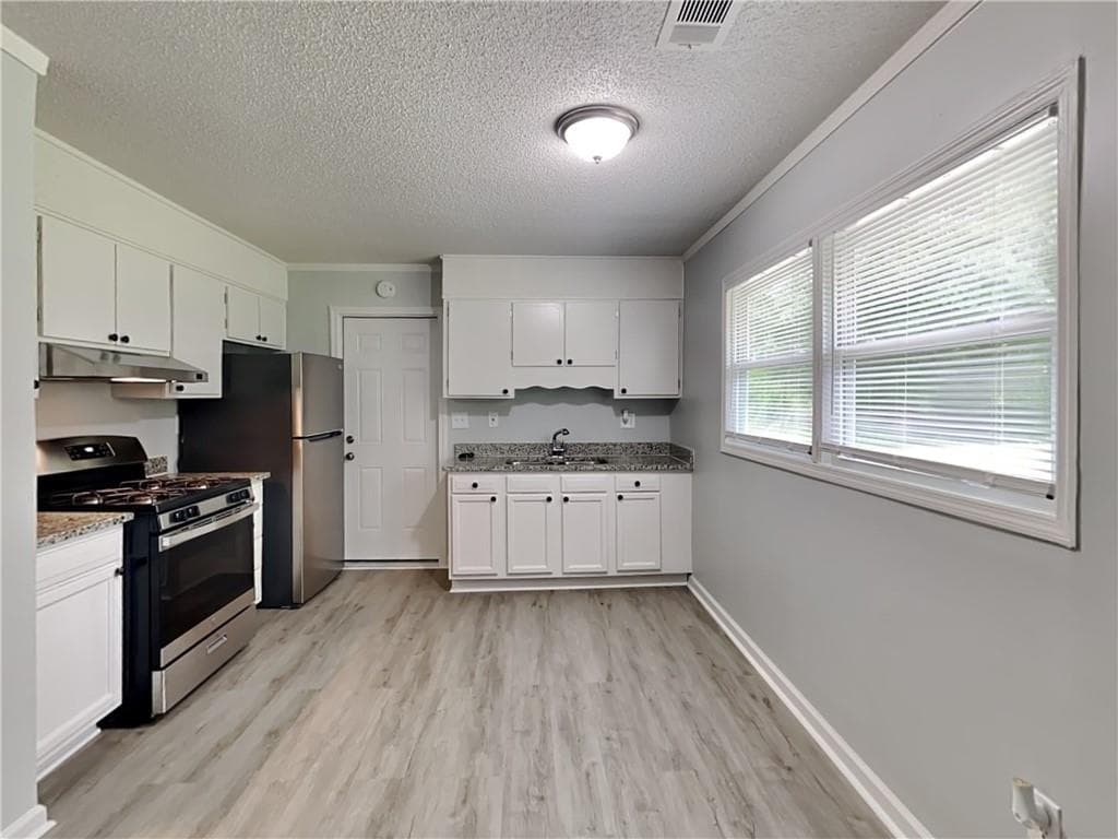 3 bedroom, 2 bathroom, 1,296 sq ft single family residence for rent at 2966 Kathy Lane, Conyers, GA 30012 for $1,735 a month — photo 2