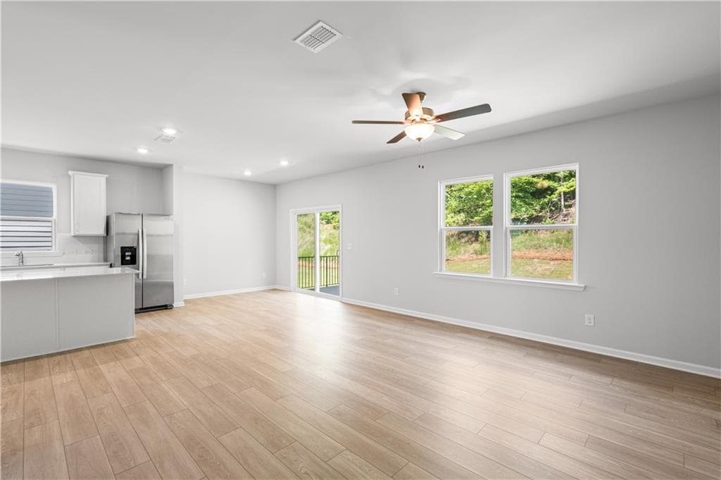 5 bedroom, 3 bathroom, 2,670 sq ft single family residence for sale at 3084 Orwell Drive, Gainesville, GA 30507 — photo 6