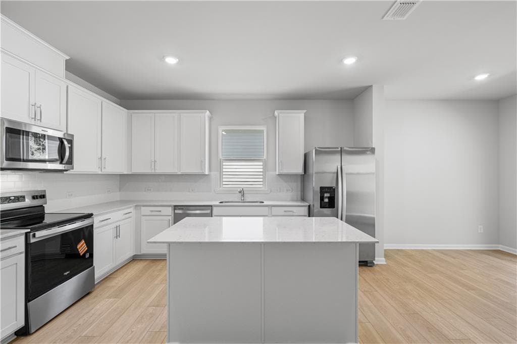 5 bedroom, 3 bathroom, 2,670 sq ft single family residence for sale at 3084 Orwell Drive, Gainesville, GA 30507 — photo 9