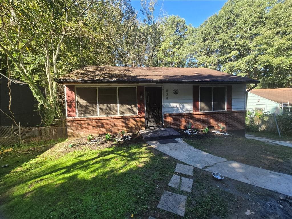 3 bedroom, 1 bathroom, 1,050 sq ft single family residence for sale at 838 Woods Drive, Atlanta, GA 30318 — photo 1 of 11
