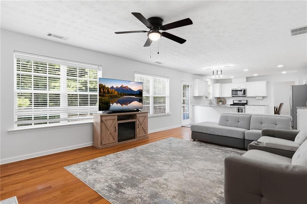 5 bedroom, 4 bathroom, 3,658 sq ft single family residence for sale at 5492 Skylar Creek Lane, Buford, GA 30518 — photo 8