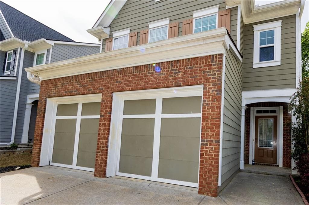 4 bedroom, 3 bathroom, 1,670 sq ft single family residence for sale at 5815 Weddington Drive, Cumming, GA 30040 — photo 1 of 24