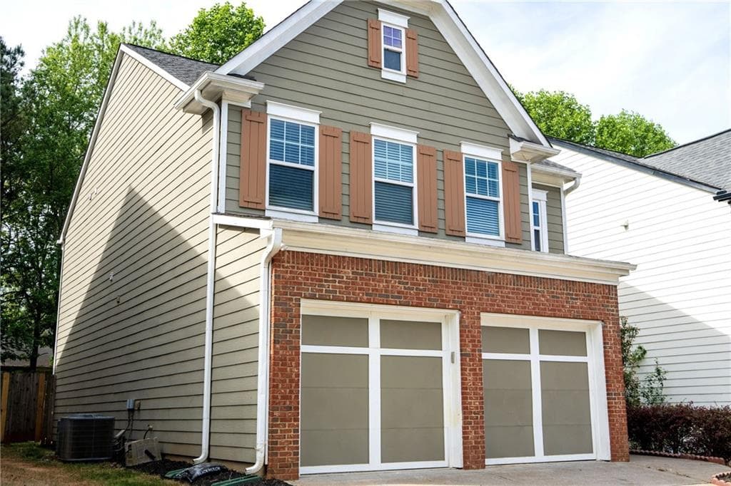 4 bedroom, 3 bathroom, 1,670 sq ft single family residence for sale at 5815 Weddington Drive, Cumming, GA 30040 — photo 2