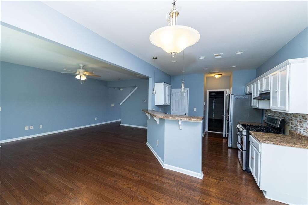 4 bedroom, 3 bathroom, 1,670 sq ft single family residence for sale at 5815 Weddington Drive, Cumming, GA 30040 — photo 5