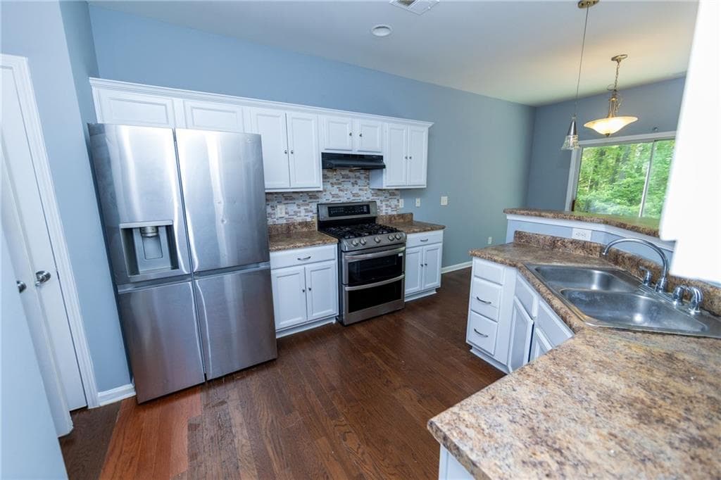 4 bedroom, 3 bathroom, 1,670 sq ft single family residence for sale at 5815 Weddington Drive, Cumming, GA 30040 — photo 9