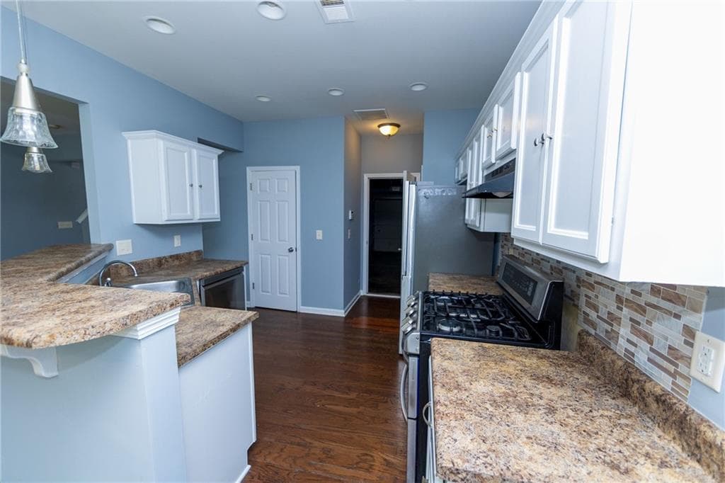 4 bedroom, 3 bathroom, 1,670 sq ft single family residence for sale at 5815 Weddington Drive, Cumming, GA 30040 — photo 10