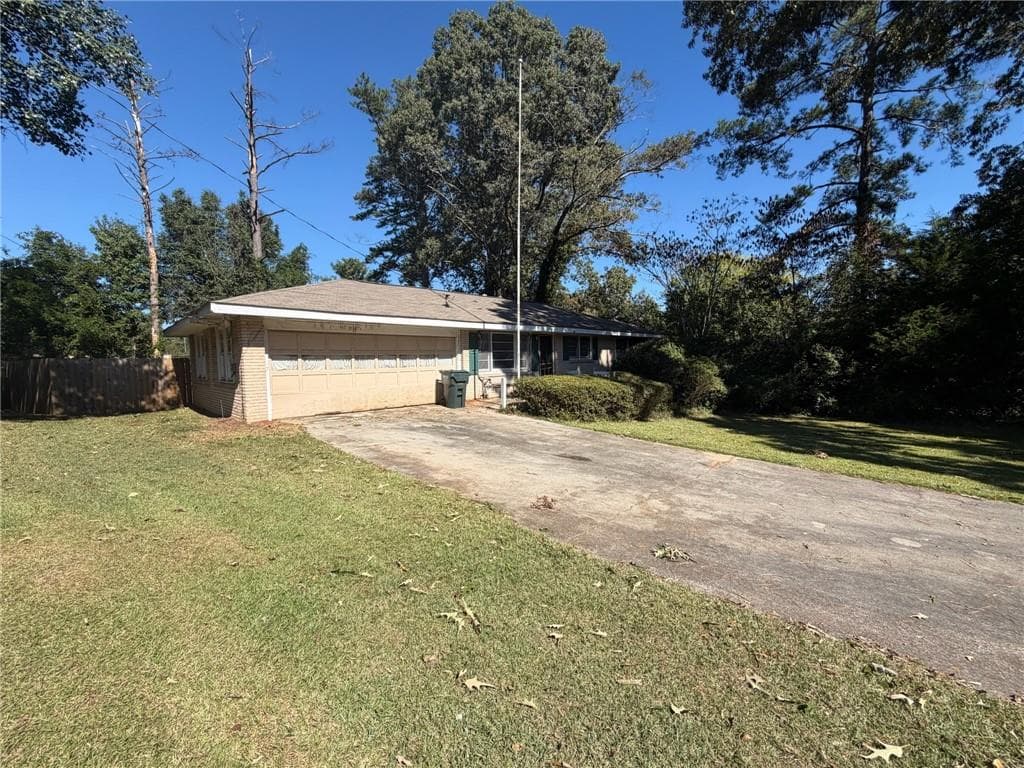 3 bedroom, 2 bathroom, 960 sq ft single family residence for sale at 5555 Noblett Road, Stone Mountain, GA 30087