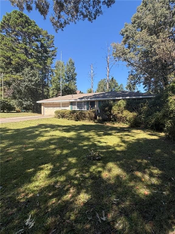 3 bedroom, 2 bathroom, 960 sq ft single family residence for sale at 5555 Noblett Road, Stone Mountain, GA 30087 — photo 2