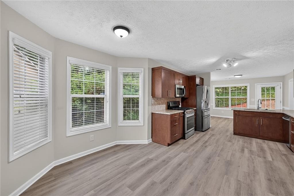 4 bedroom, 2 bathroom, 1,969 sq ft single family residence for sale at 1345 Friendswood Cove, Lawrenceville, GA 30043 — photo 6