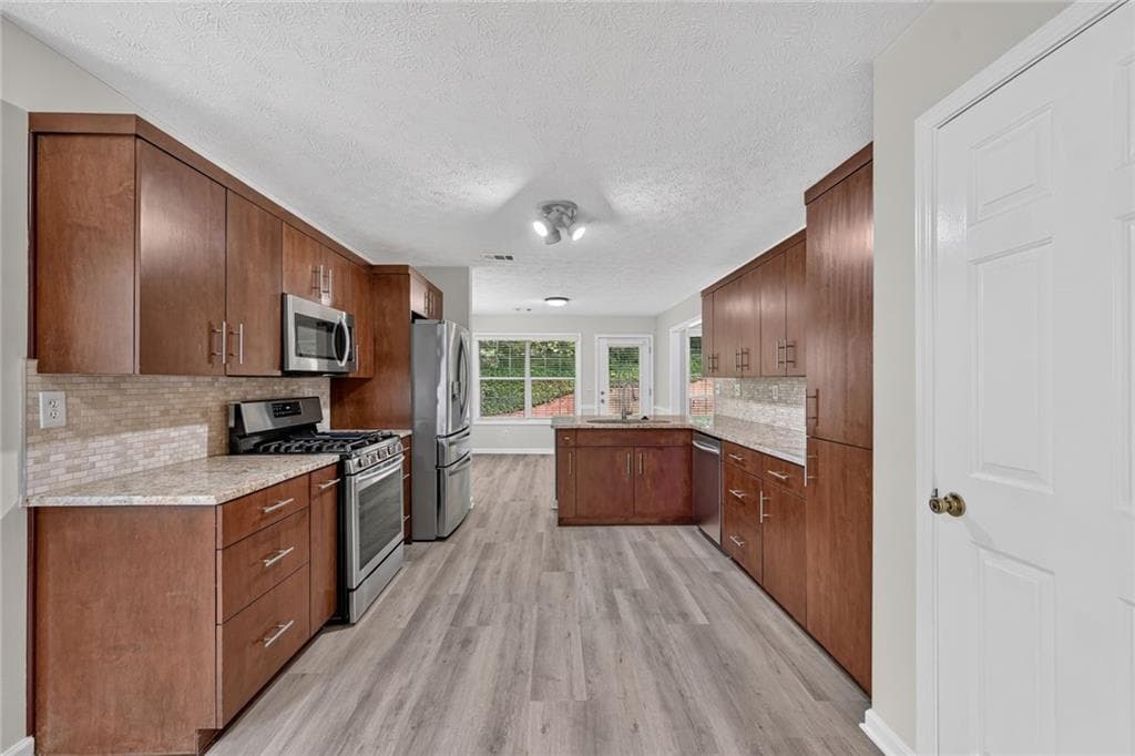 4 bedroom, 2 bathroom, 1,969 sq ft single family residence for sale at 1345 Friendswood Cove, Lawrenceville, GA 30043 — photo 8
