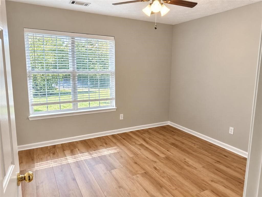 5 bedroom, 2 bathroom, 2,159 sq ft single family residence for sale at 1055 Chatham Road, Buford, GA 30518 — photo 7