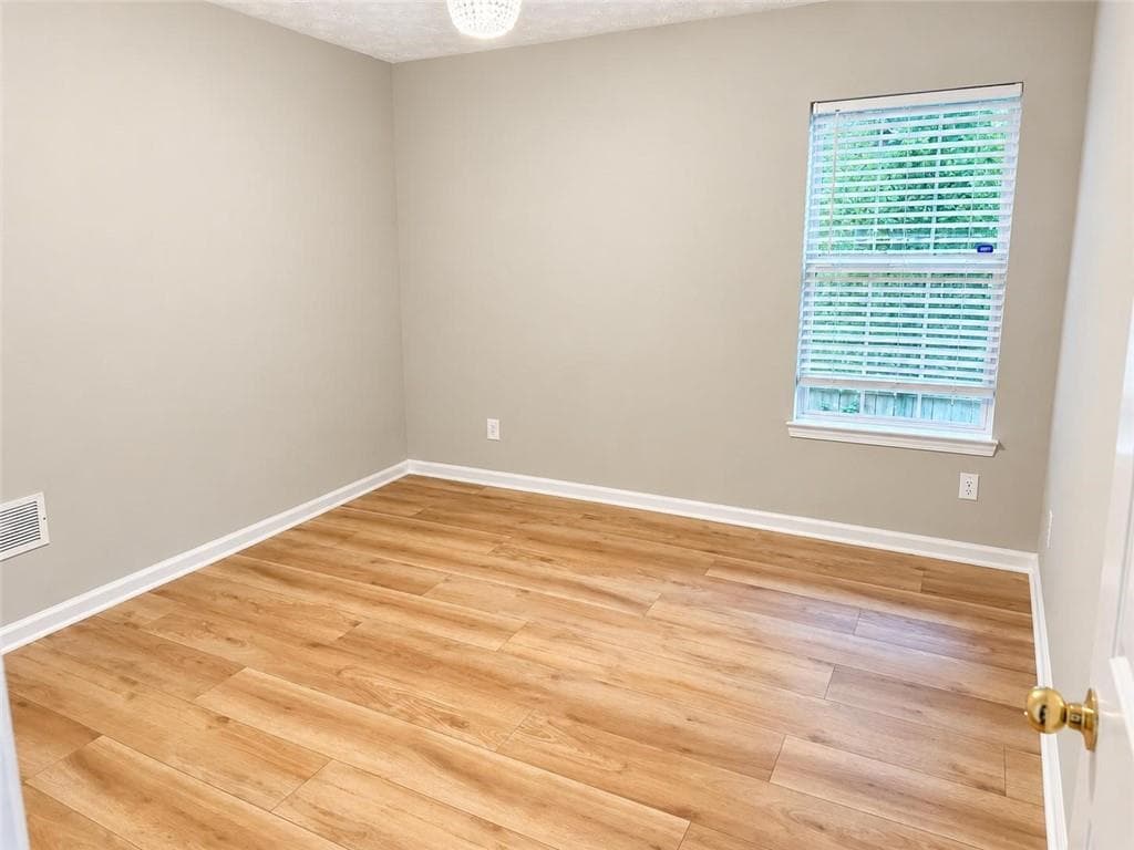 5 bedroom, 2 bathroom, 2,159 sq ft single family residence for sale at 1055 Chatham Road, Buford, GA 30518 — photo 9