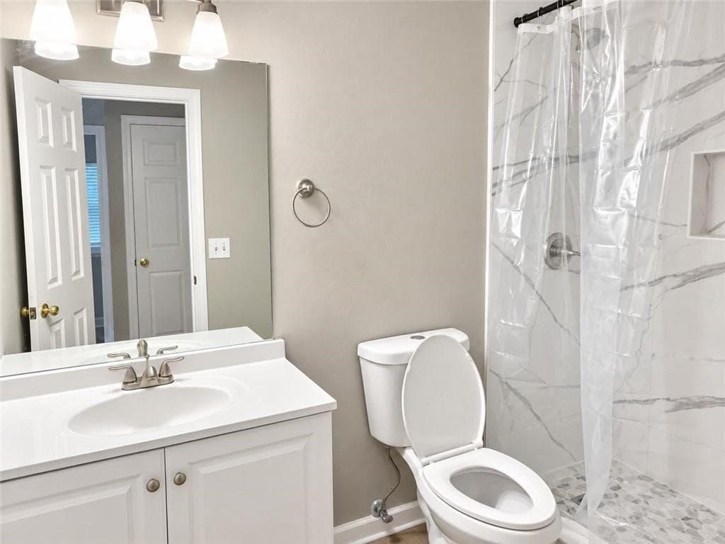 5 bedroom, 2 bathroom, 2,159 sq ft single family residence for sale at 1055 Chatham Road, Buford, GA 30518 — photo 10