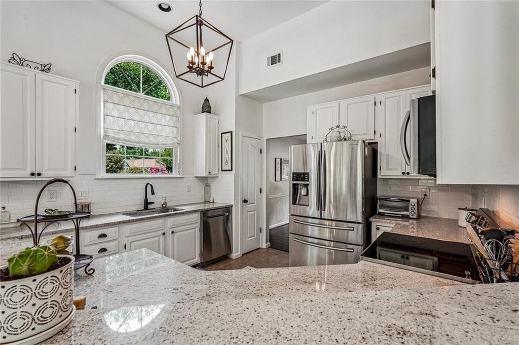 4 bedroom, 3 bathroom, 2,672 sq ft single family residence for sale at 162 St Martin Drive, Suwanee, GA 30024 — photo 10