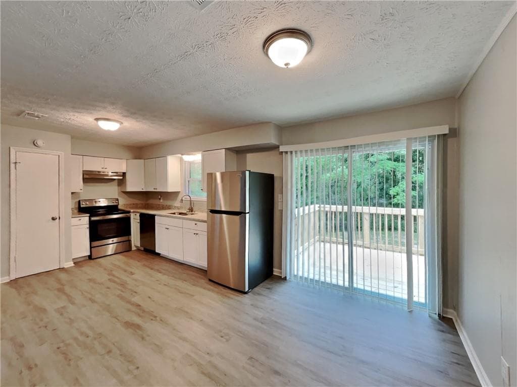 3 bedroom, 2 bathroom, 1,344 sq ft single family residence for rent at 2938 Woodfield Drive, Rex, GA 30273 for $1,790 a month — photo 3