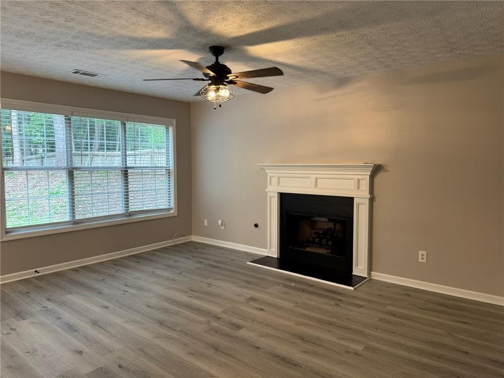 4 bedroom, 3 bathroom, 2,332 sq ft single family residence for rent at 7454 Woody Springs Drive, Flowery Branch, GA 30542 for $2,300 a month — photo 2