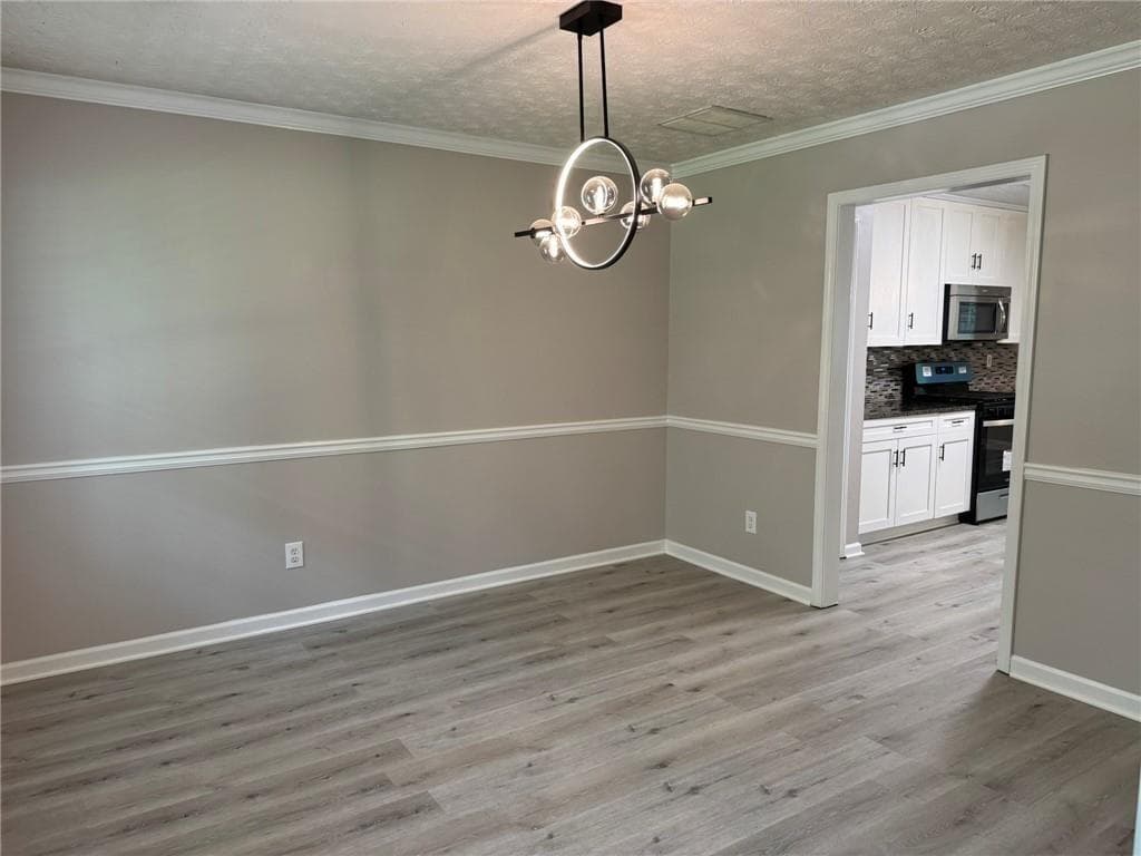 4 bedroom, 3 bathroom, 2,332 sq ft single family residence for rent at 7454 Woody Springs Drive, Flowery Branch, GA 30542 for $2,300 a month — photo 4