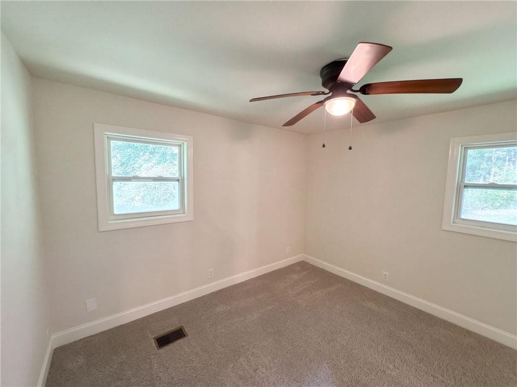 3 bedroom, 2 bathroom, 1,358 sq ft single family residence for sale at 4141 E Fairview Road, Stockbridge, GA 30281 — photo 4