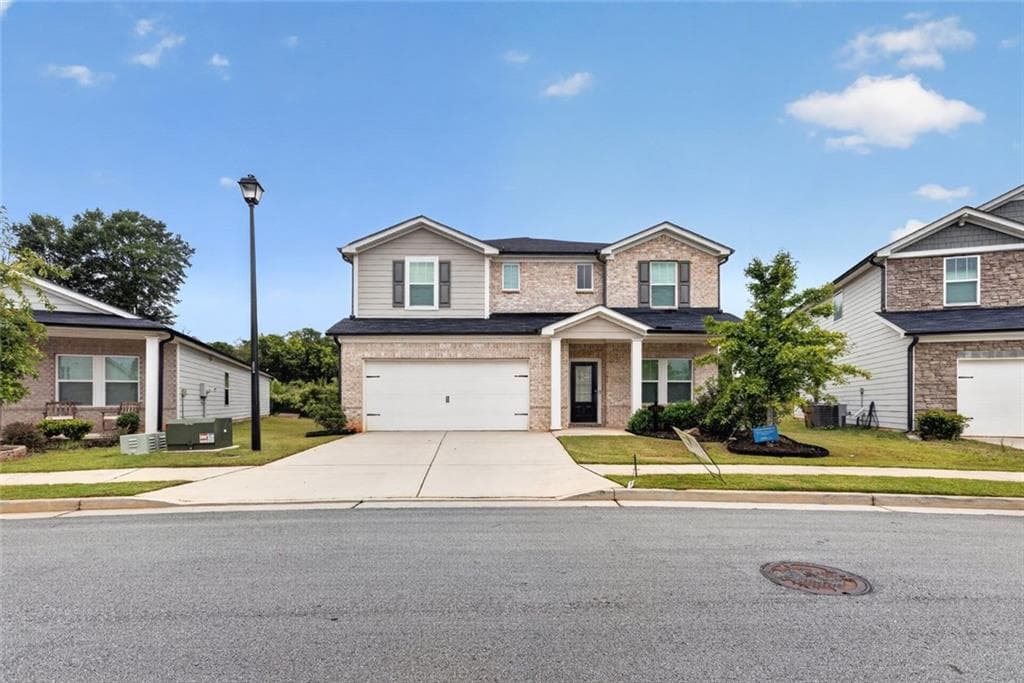 5 bedroom, 3 bathroom, 3,007 sq ft single family residence for sale at 5911 Green Ash Court, Braselton, GA 30517 — photo 1 of 46