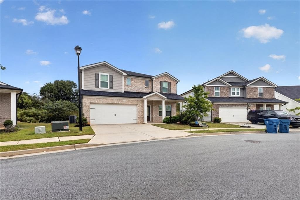 5 bedroom, 3 bathroom, 3,007 sq ft single family residence for sale at 5911 Green Ash Court, Braselton, GA 30517 — photo 3