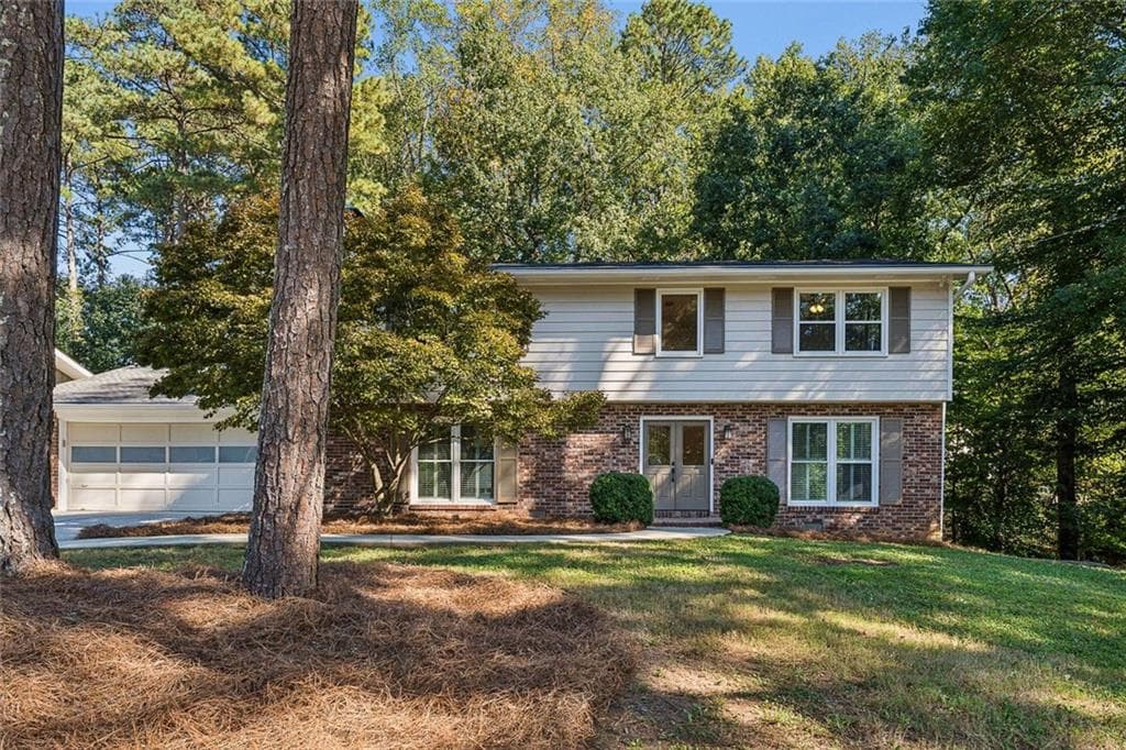 5 bedroom, 3 bathroom, 2,862 sq ft single family residence for sale at 4613 Sharon Valley Court, Atlanta, GA 30338 — photo 1 of 52