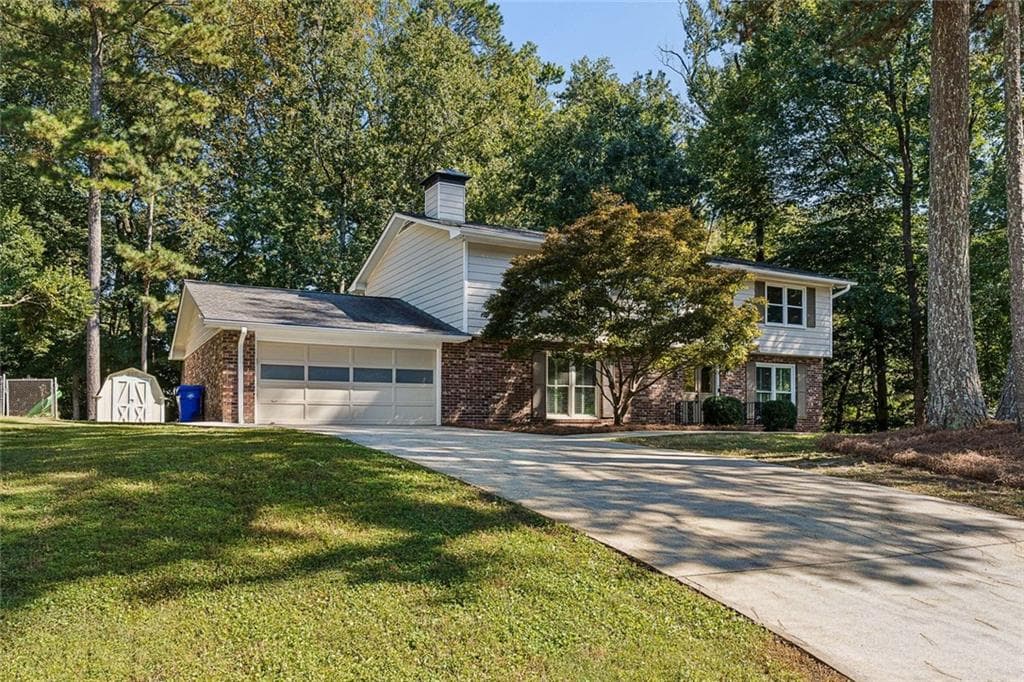 5 bedroom, 3 bathroom, 2,862 sq ft single family residence for sale at 4613 Sharon Valley Court, Atlanta, GA 30338 — photo 2