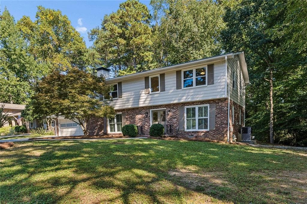 5 bedroom, 3 bathroom, 2,862 sq ft single family residence for sale at 4613 Sharon Valley Court, Atlanta, GA 30338 — photo 3