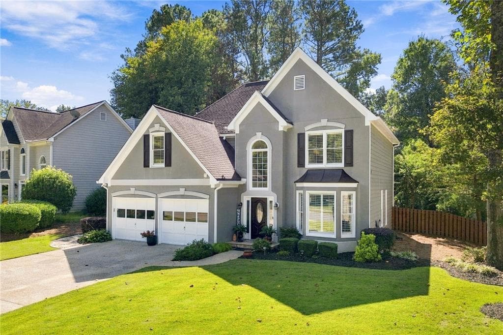 4 bedroom, 3 bathroom, 2,261 sq ft single family residence for sale at 4035 Dream Catcher Drive, Woodstock, GA 30189
