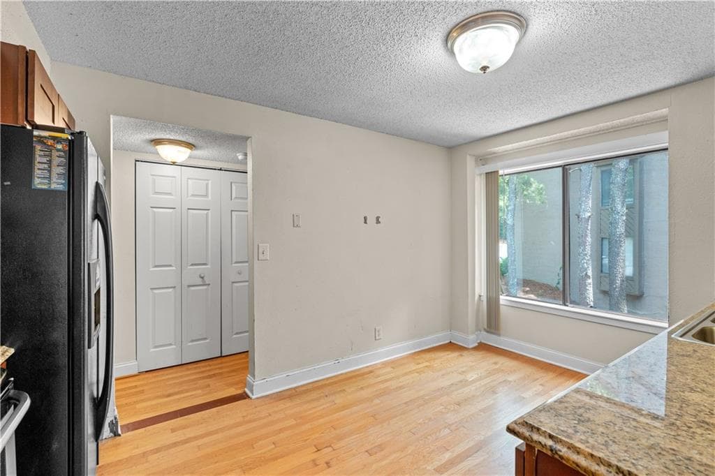 1 bedroom, 1 bathroom, 943 sq ft condominium for sale at 814 Seasons Parkway, Norcross, GA 30093 — photo 4
