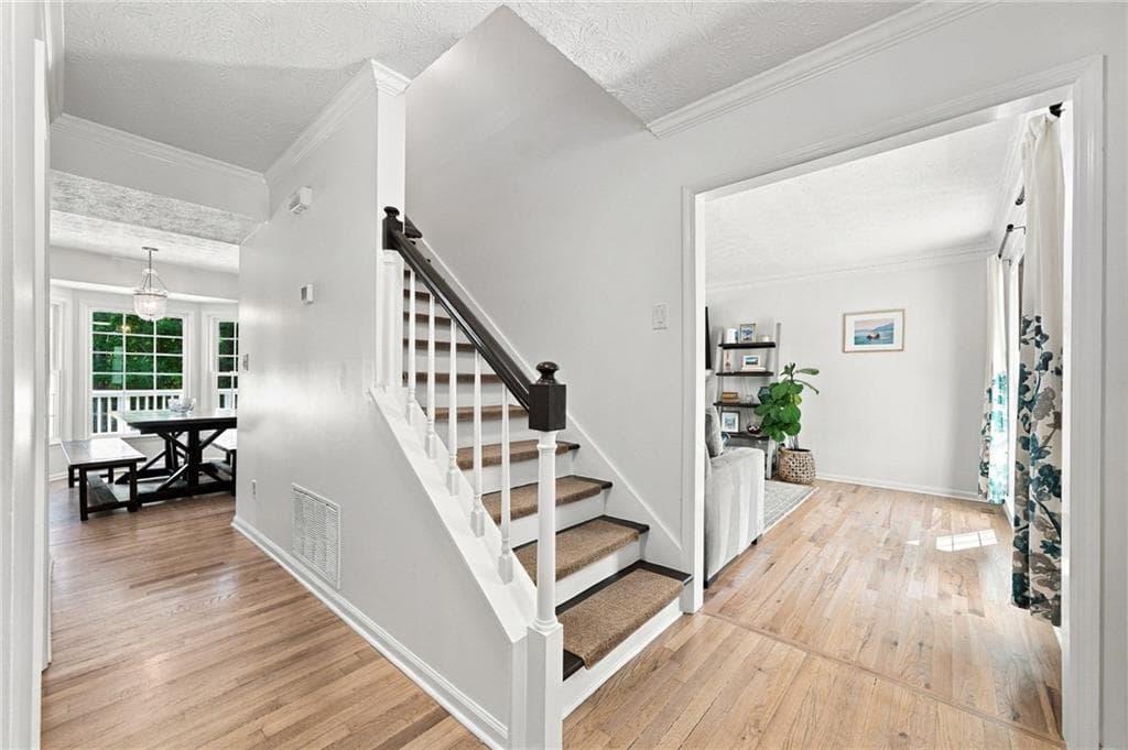 4 bedroom, 3 bathroom, 2,090 sq ft single family residence for sale at 9255 Brumbelow Crossing Way, Alpharetta, GA 30022 — photo 8