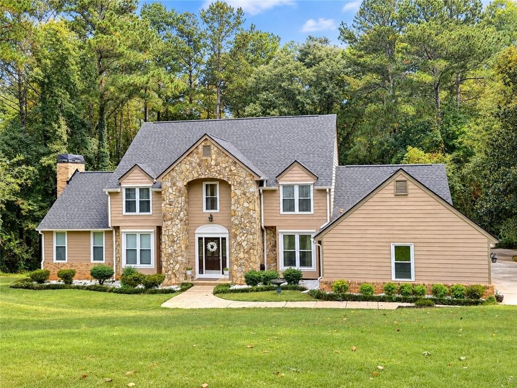 6 bedroom, 4 bathroom, 3,680 sq ft single family residence for sale at 1208 Milford Forest Drive, Marietta, GA 30008 — photo 2