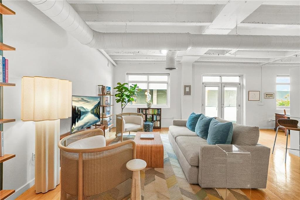 1 bedroom, 1 bathroom, 1,195 sq ft condominium for sale at 805 Peachtree Street 107, Atlanta, GA 30308 — photo 1 of 27