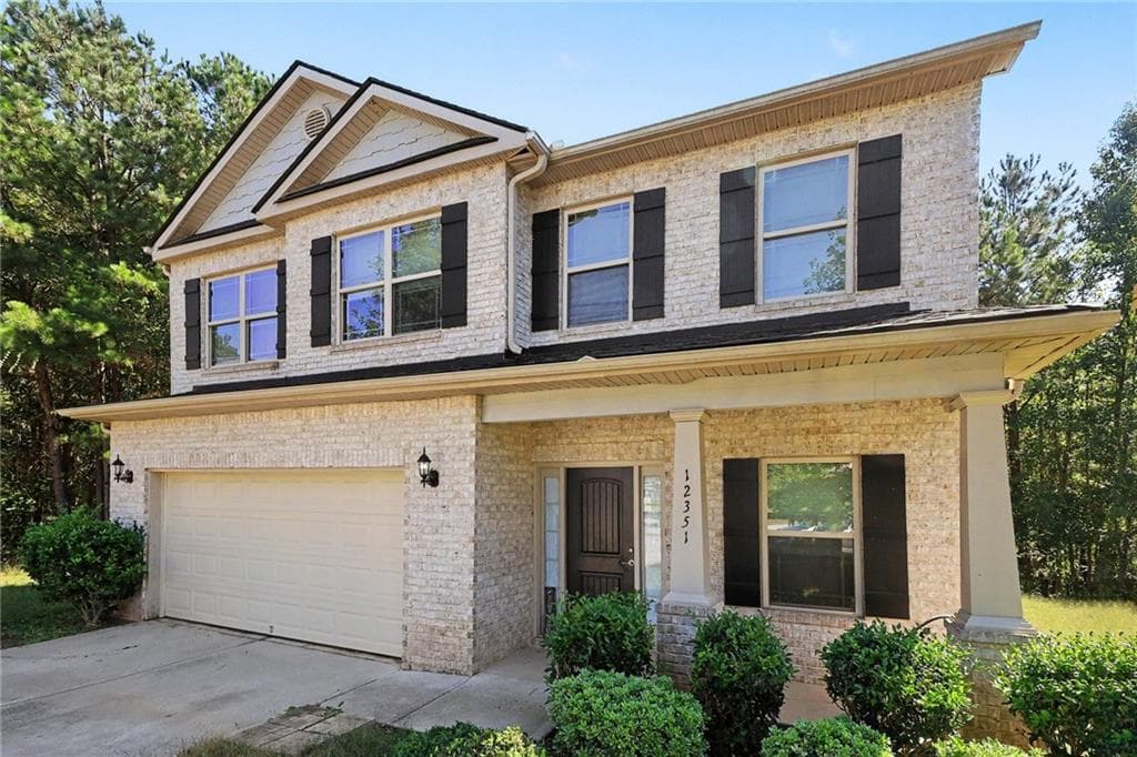 4 bedroom, 3 bathroom, 2,378 sq ft single family residence for sale at 12351 Styron Drive, Hampton, GA 30228 — photo 1 of 15