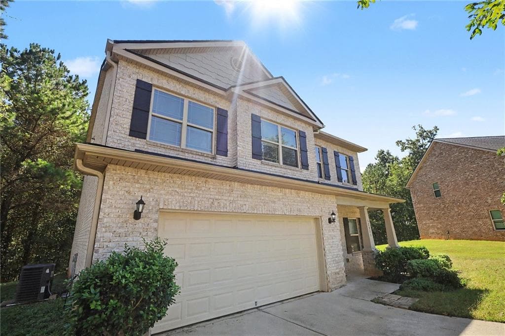 4 bedroom, 3 bathroom, 2,378 sq ft single family residence for sale at 12351 Styron Drive, Hampton, GA 30228 — photo 2