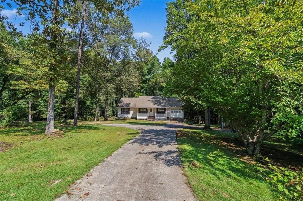 4 bedroom, 3 bathroom, 1,312 sq ft single family residence for sale at 6854 John West Road, Winston, GA 30187 — photo 2