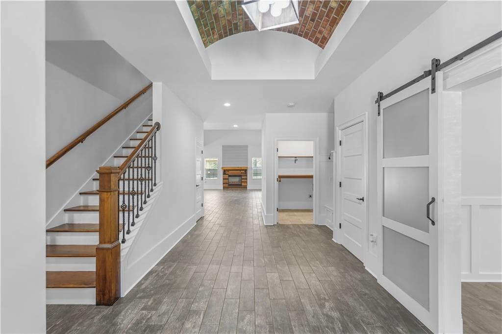 6 bedroom, 5 bathroom, 4,976 sq ft single family residence for sale at 2152 Mason Terrace, Snellville, GA 30078 — photo 2