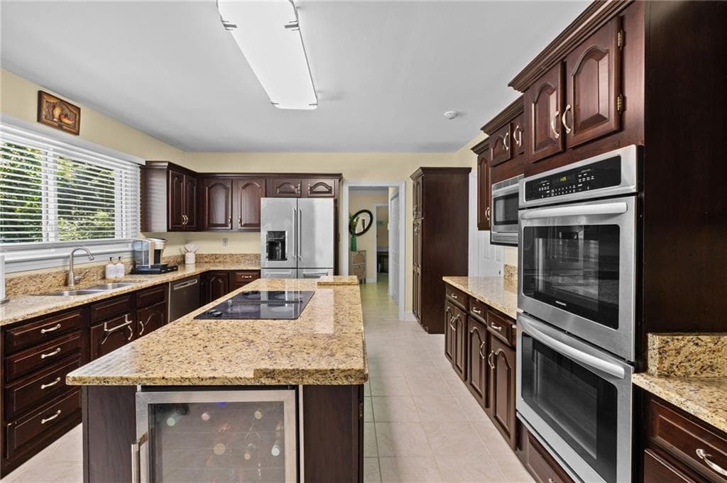 6 bedroom, 4 bathroom, 3,680 sq ft single family residence for sale at 1208 Milford Forest Drive, Marietta, GA 30008 — photo 6