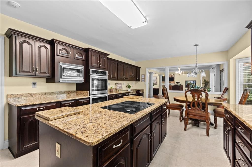 6 bedroom, 4 bathroom, 3,680 sq ft single family residence for sale at 1208 Milford Forest Drive, Marietta, GA 30008 — photo 7
