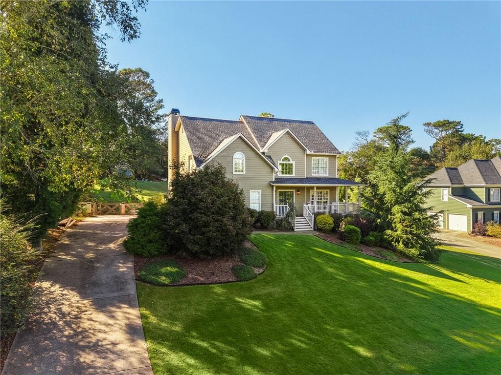5 bedroom, 4 bathroom, 3,636 sq ft single family residence for sale at 4255 Fairfax Drive, Cumming, GA 30028 — photo 2