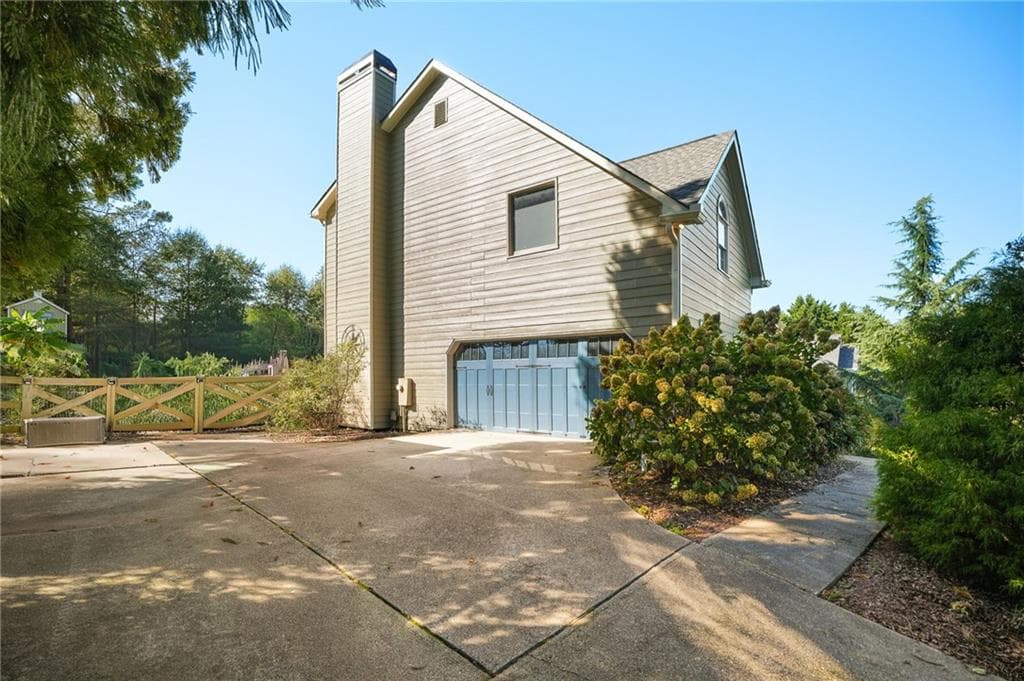 5 bedroom, 4 bathroom, 3,636 sq ft single family residence for sale at 4255 Fairfax Drive, Cumming, GA 30028 — photo 4