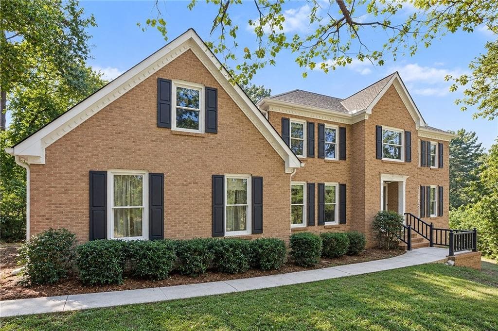 4 bedroom, 3 bathroom, 3,941 sq ft single family residence for sale at 4857 Castlewood Drive, Lilburn, GA 30047 — photo 1 of 33